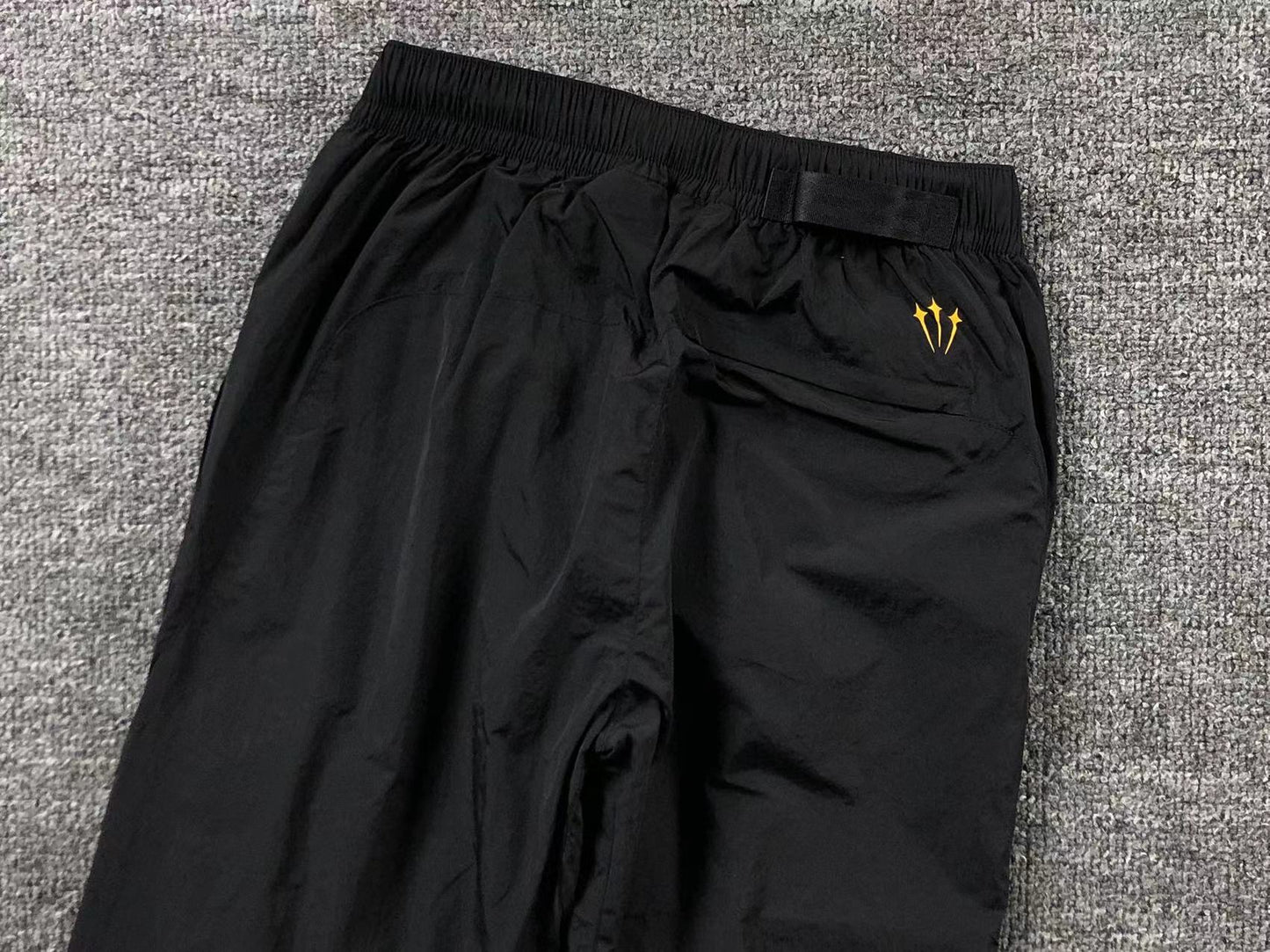 Conjunto Nike x NOCTA Woven "Amarelo e Preto"