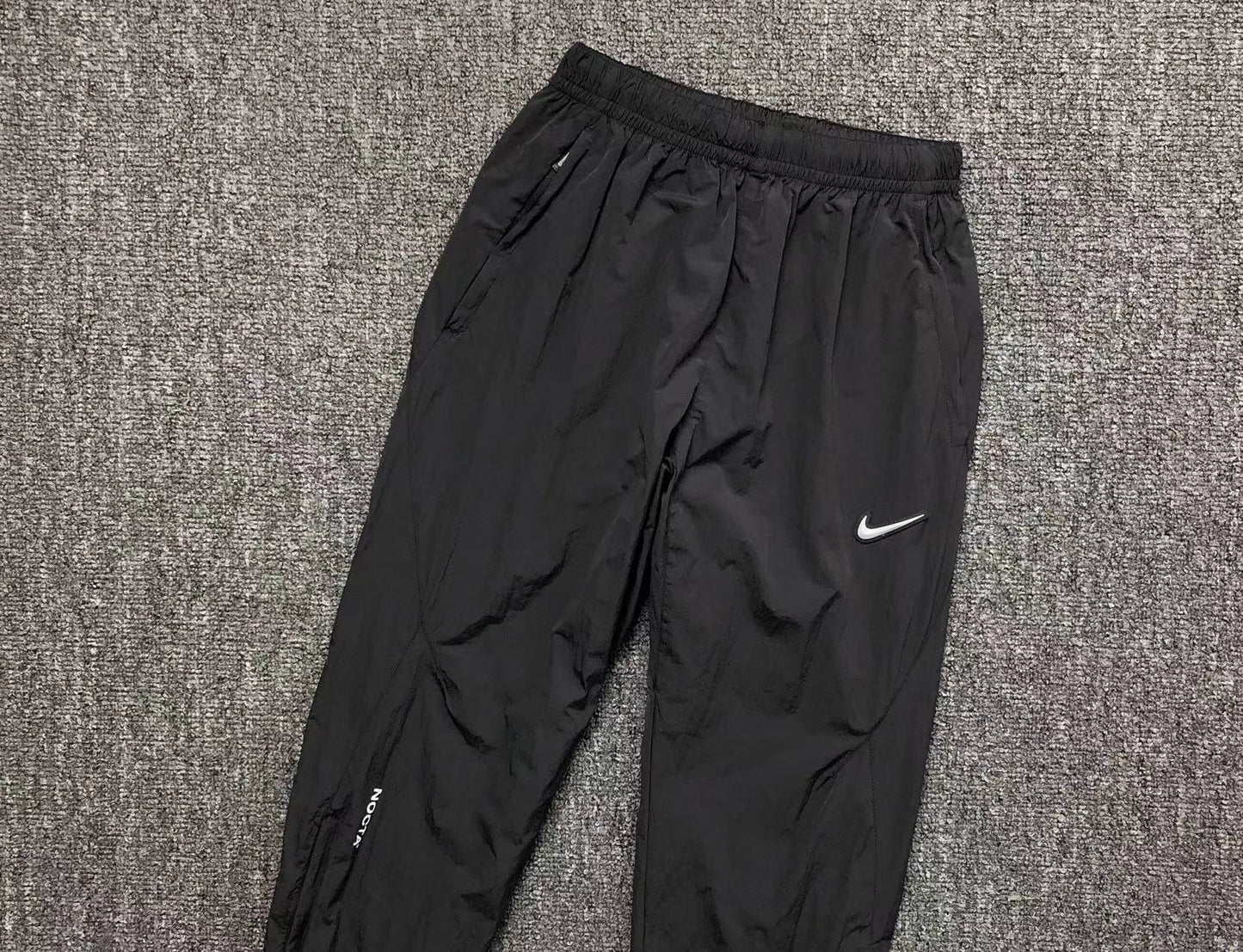 Conjunto Nike x NOCTA Woven "Preto e Cinza"
