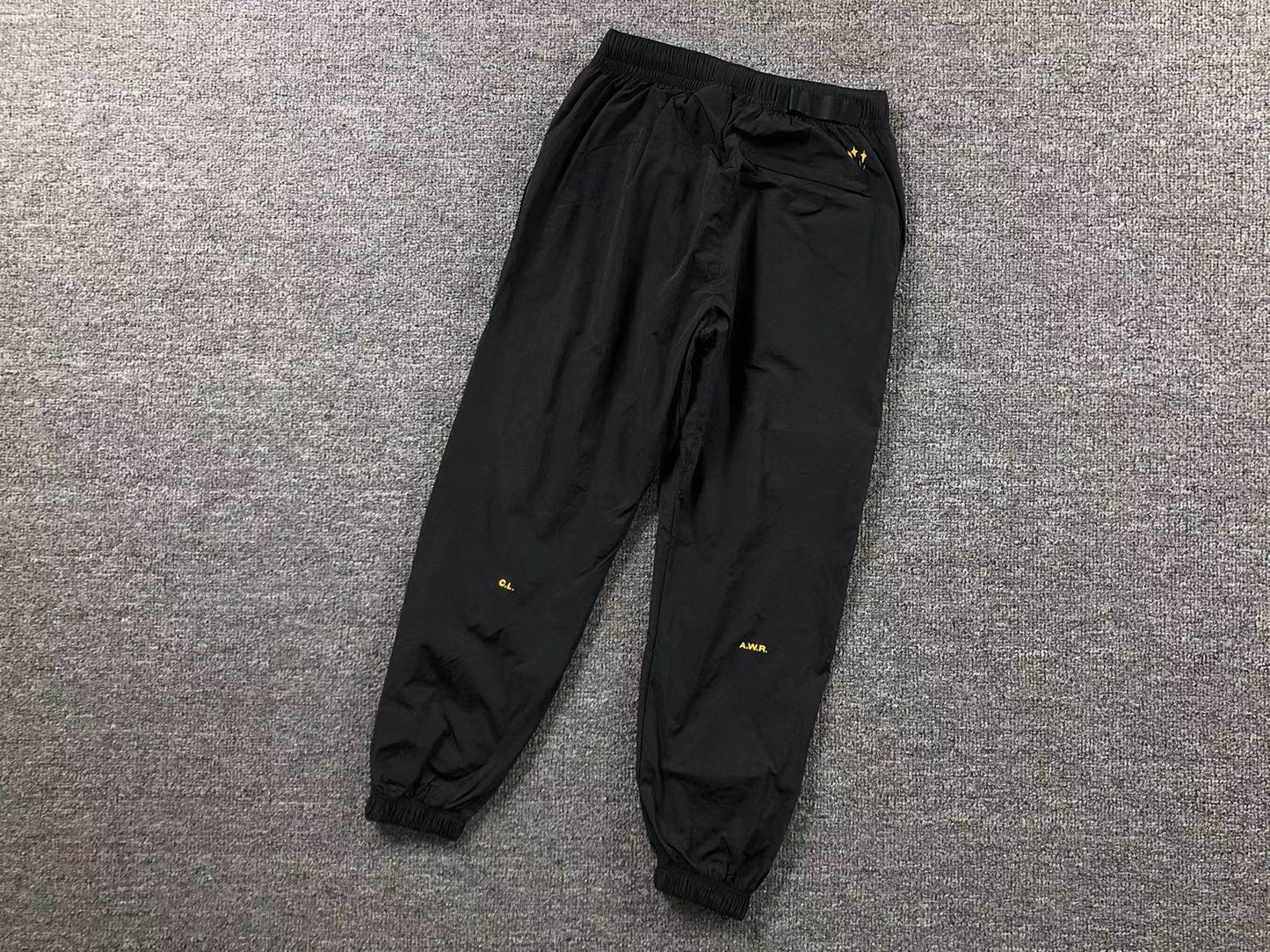 Conjunto Nike x NOCTA Woven "Amarelo e Preto"