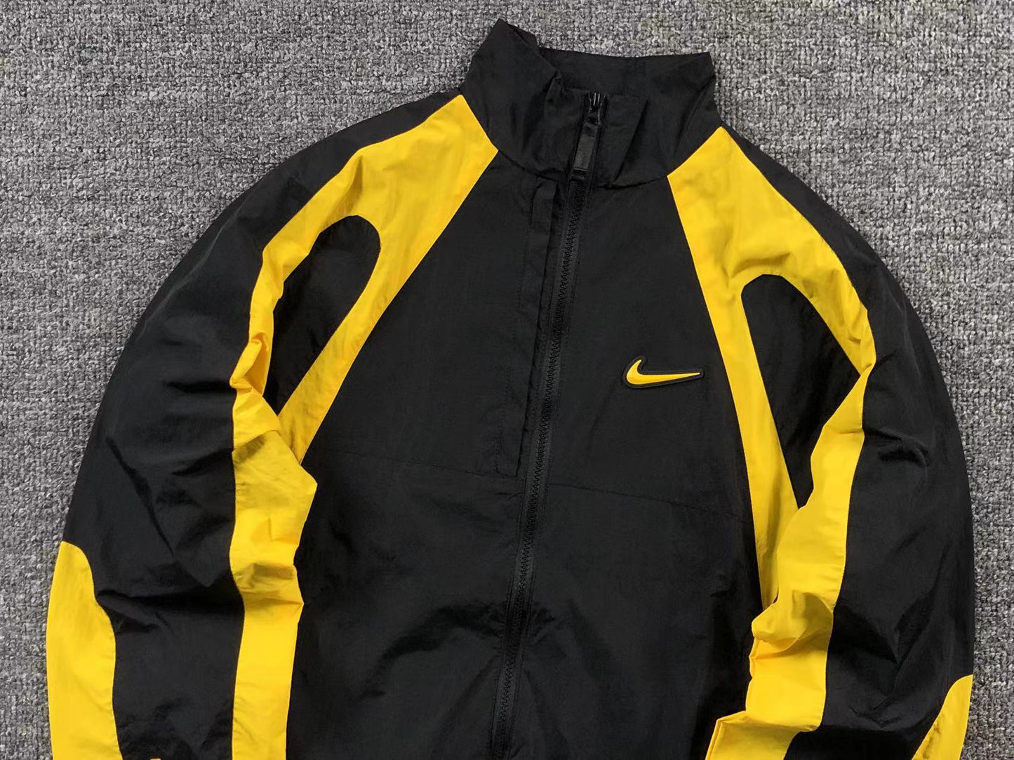 Conjunto Nike x NOCTA Woven "Amarelo e Preto"