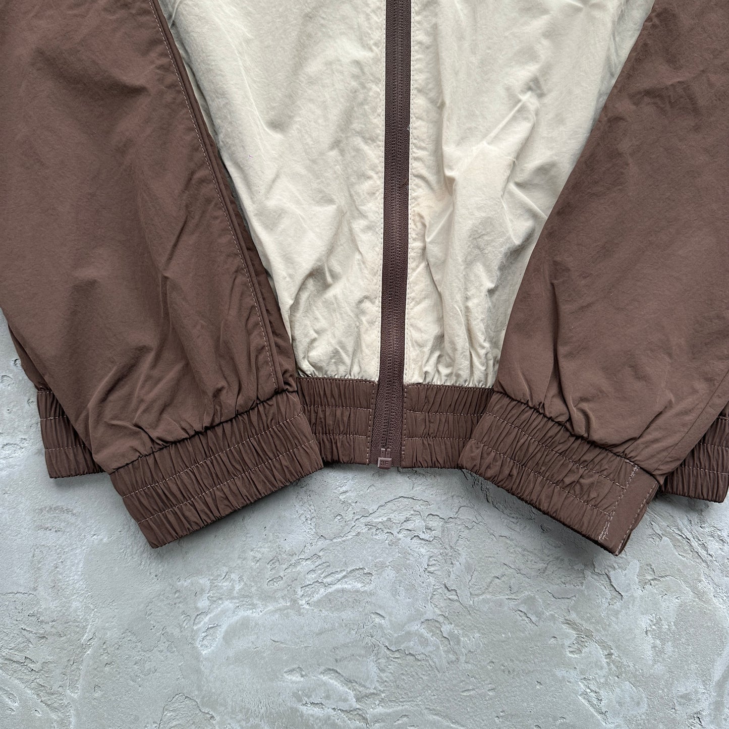 Conjunto Corta Vento SYNA World Marrom
