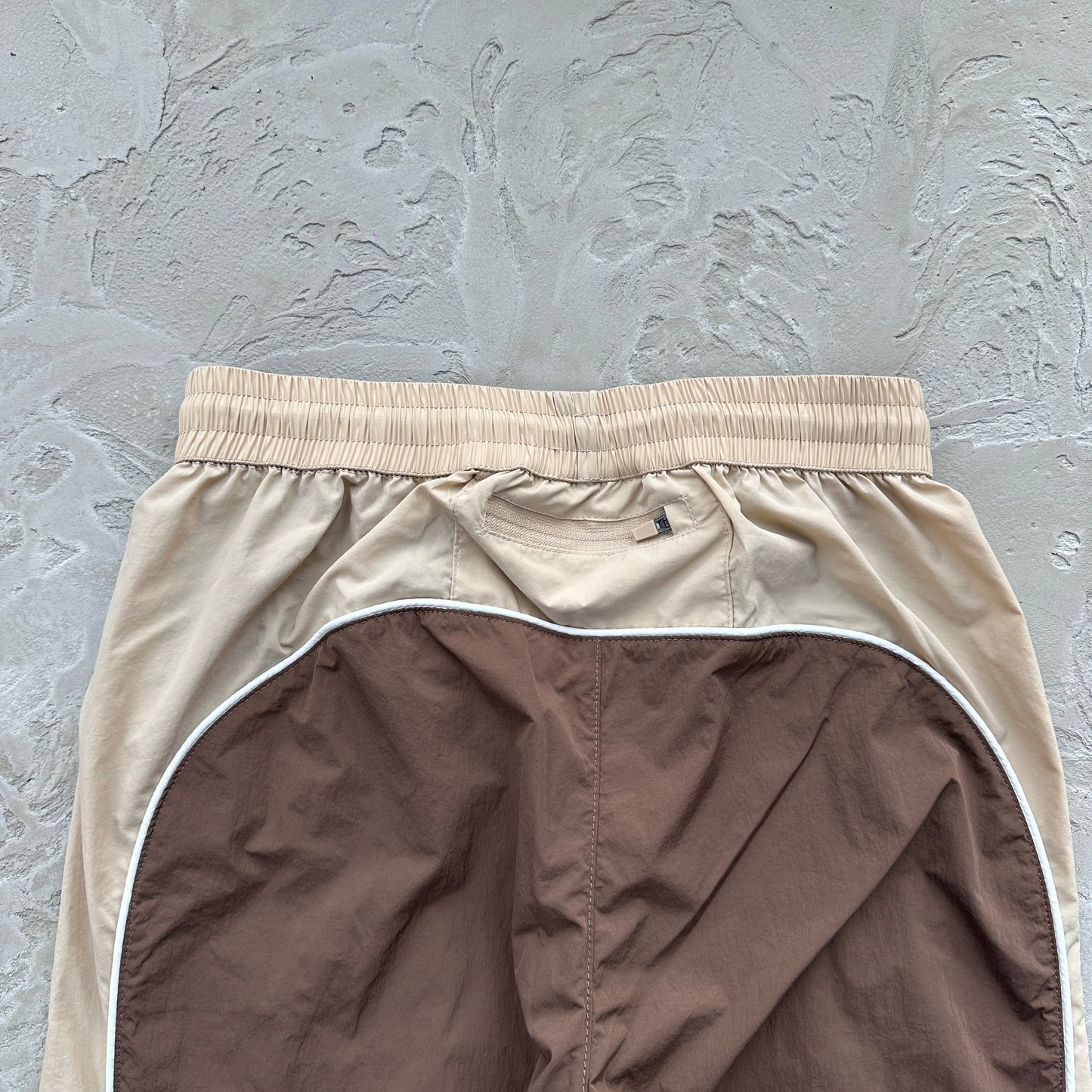 Conjunto Corta Vento SYNA World Marrom