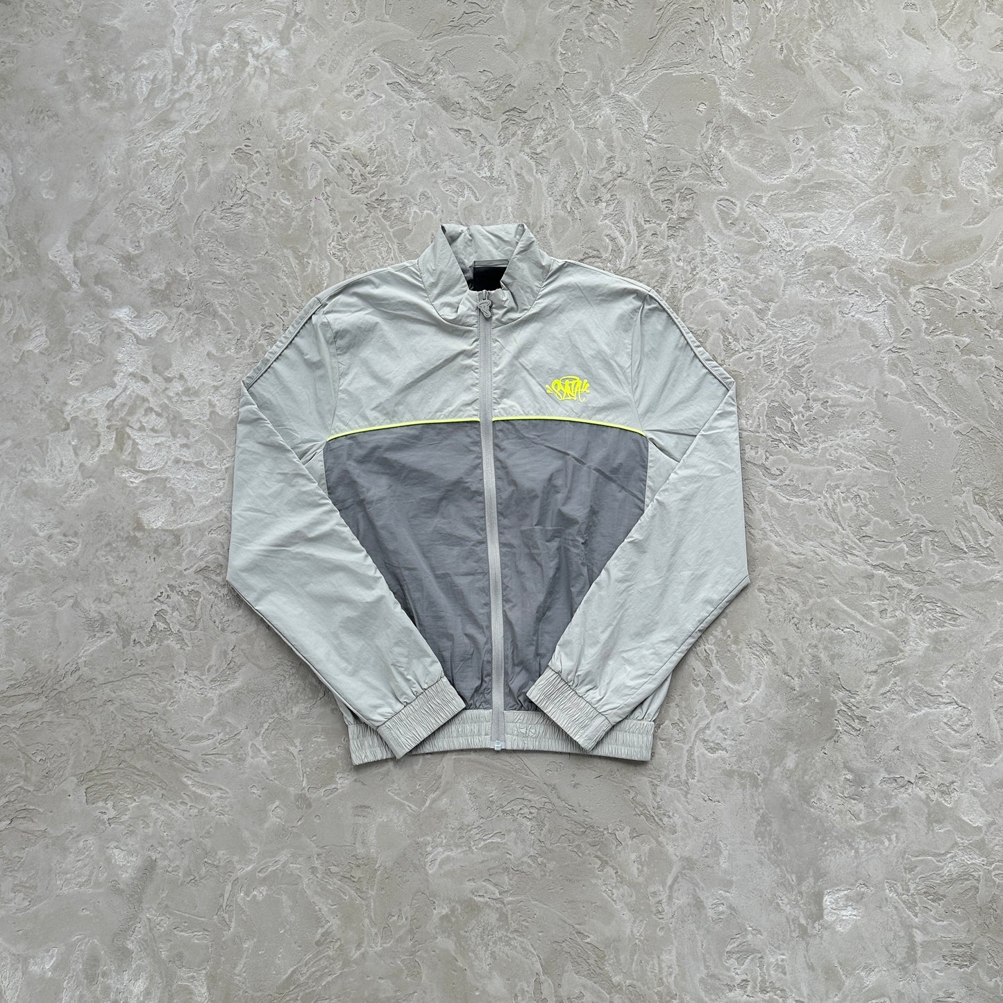 Conjunto Corta Vento SYNA World Cinza e Verde
