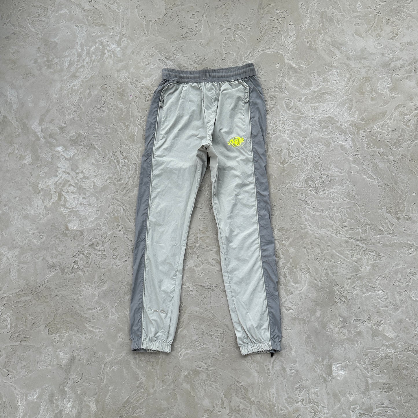 Conjunto Corta Vento SYNA World Cinza e Verde