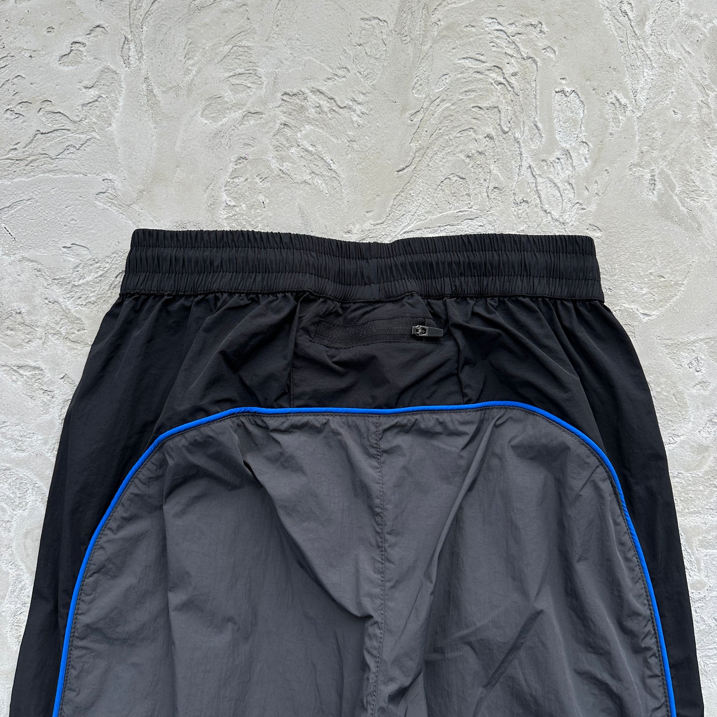 Conjunto Corta Vento SYNA World Preto e Azul