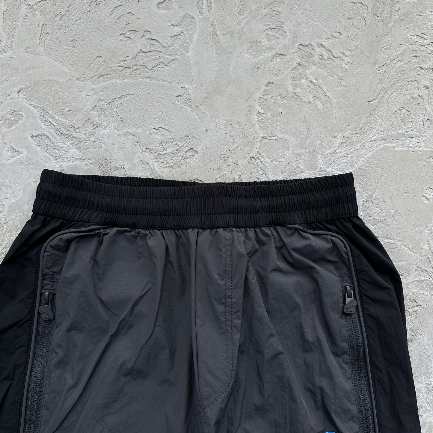 Conjunto Corta Vento SYNA World Preto e Azul