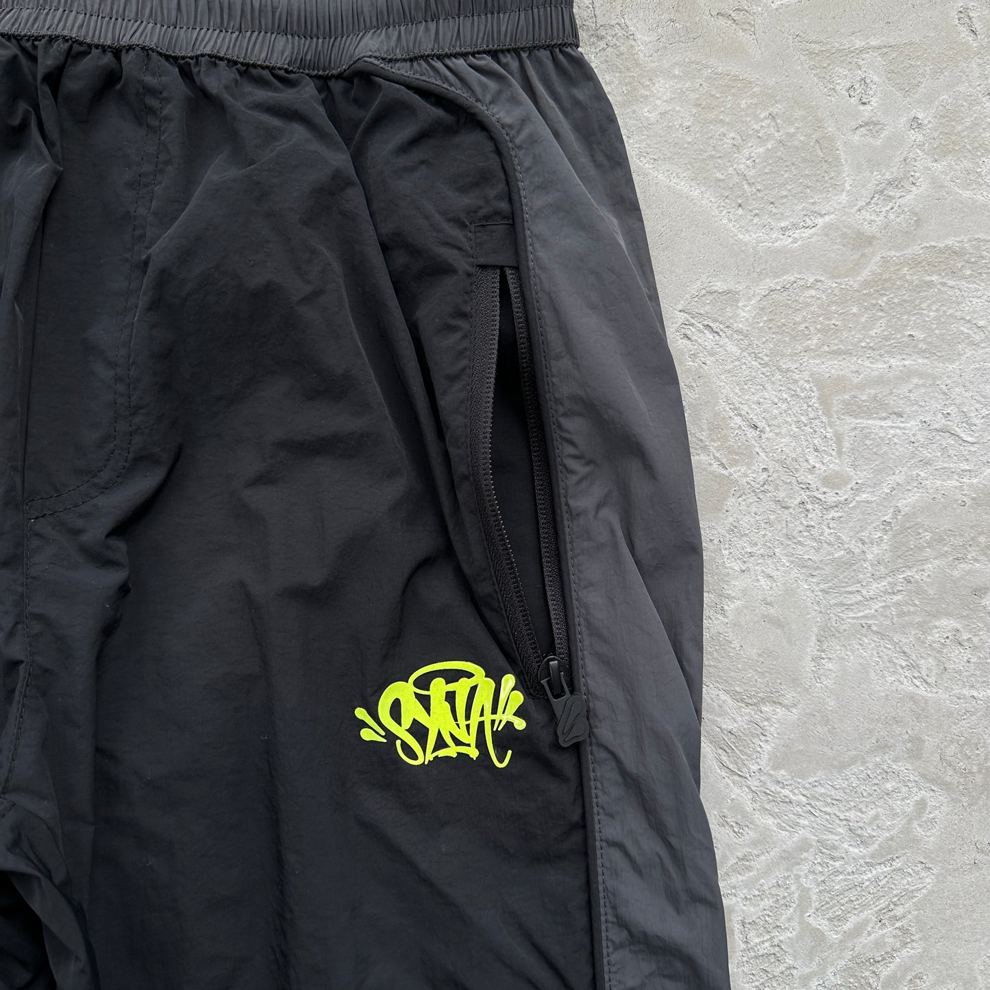 Conjunto Corta Vento SYNA World Preto e Verde