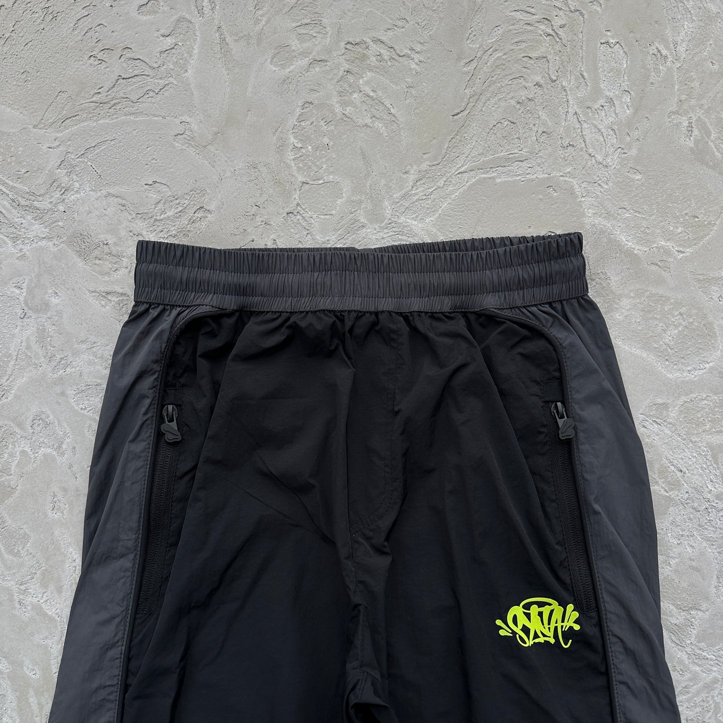 Conjunto Corta Vento SYNA World Preto e Verde