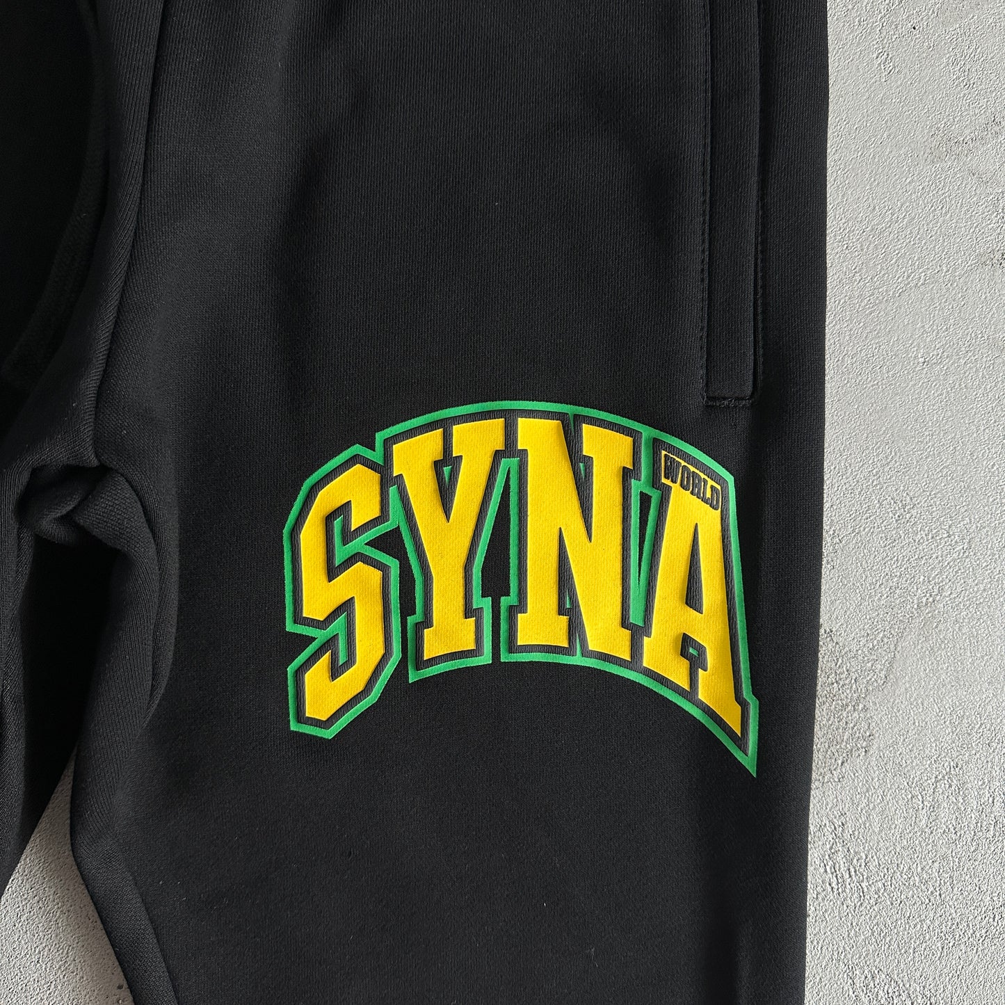 Conjunto SYNA World Preto/Amarelo/Verde